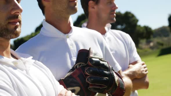 Cricket player standing together during cricket match alt