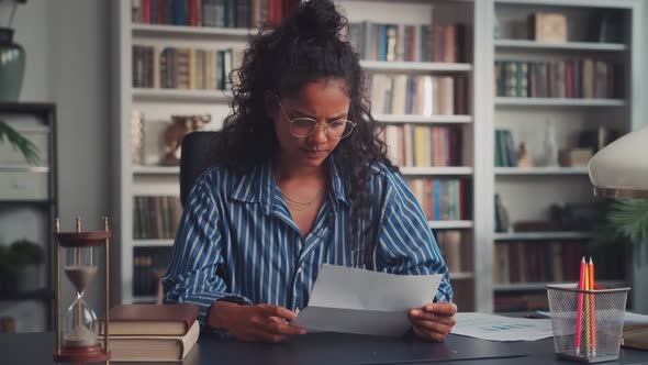 Upset Indian Young Woman Feel Frustrated Open Envelope at Home Reading Bad News alt