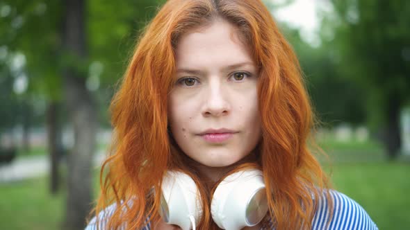  Close up Portrait Yyoung Beautiful Student with Headphones  alt