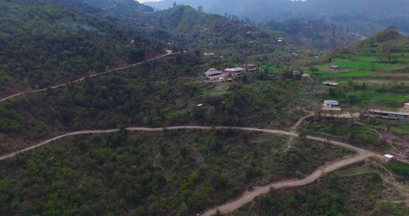 A sharp, curvy and dangerous road on the mountains. alt