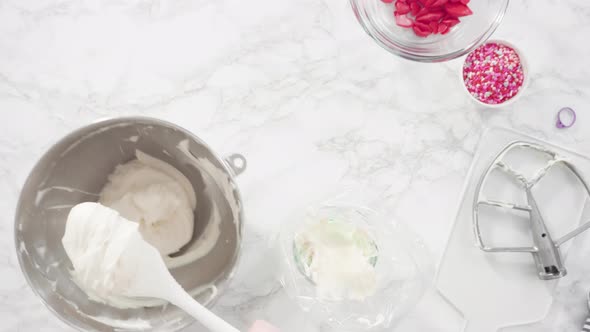 Flat lay. Step by step. Mixing ingredients in a standing kitchen mixer to prepare cream cheese frost alt