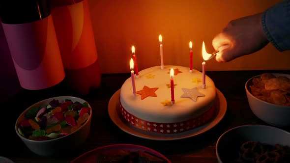Birthday Candles Are  Lit And Blown Out On Table alt