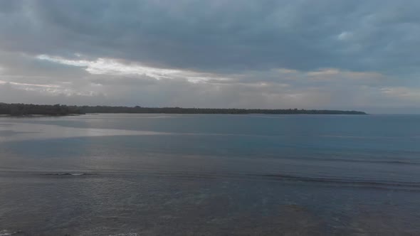 Majestic View on Island Coast From Romantic Terrace With Table For Two, Aerial View Pull Back Reveal alt