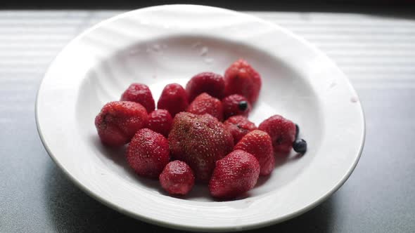 Fresh Strawberries in a Plate on the Table