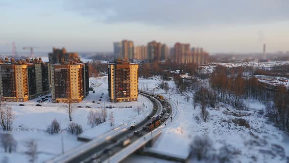 winter road aerial view of a big city in winter