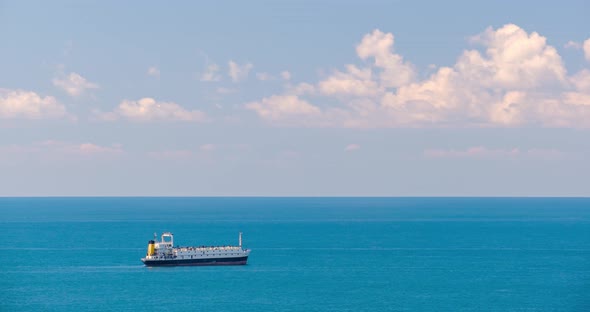 Seascape with cargo container industrial ship anchored waiting for entering Batumi port alt