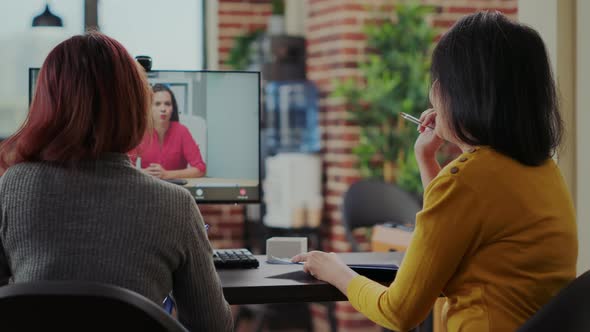 Coworkers Interviewing Candidate for Job Application on Video Conference alt