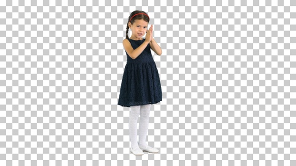 Delighted girl in black dress clapping her hands, Alpha Channel alt