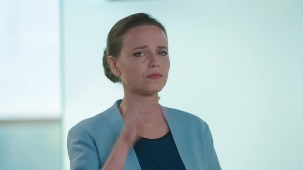 Worried Stressed Beautiful Woman with Migraine Looking at Camera Checking Tablet Sighing alt