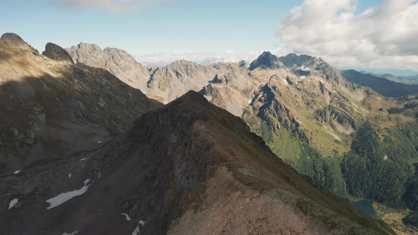Aerial view of highland landscape, drone movin near mountains