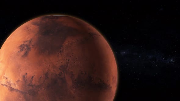 Spinning planet mars on dark .Planet mars sun rise isolate on darkVd 1577
