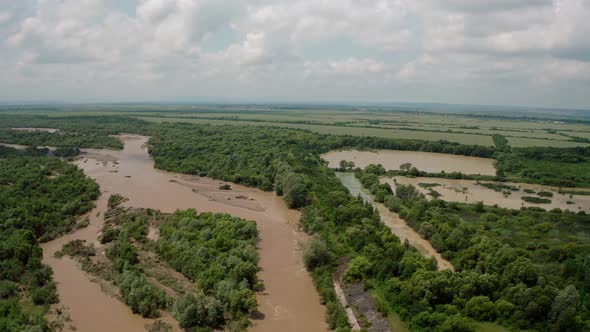 Aerial Drone View. Rriver Water Big and Dirty After Heavy Rain. Wide View V2 alt