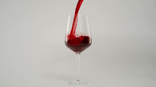 Pouring Red Wine in Glass at 1000 Fps Super Slow Motion Shot alt