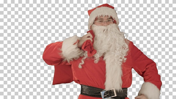 Real Santa Claus carrying presents in his sack, Alpha Channel