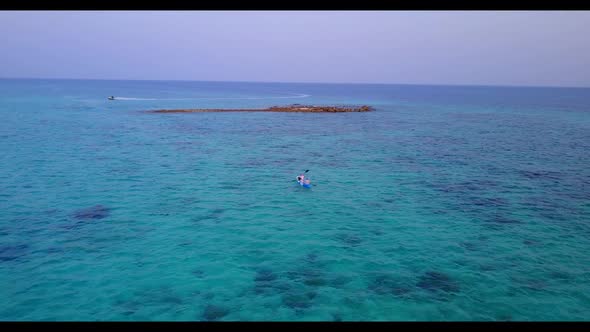 Aerial top view sky of paradise tourist beach journey by blue ocean and white sand background of a d alt
