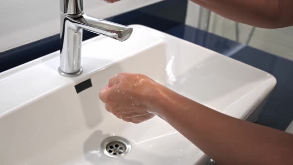 Washing Hands Rubbing with Soap Voman for Corona Virus Prevention Hygiene to Stop Spreading Covid