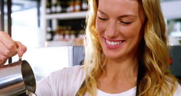 Waitress making cup of coffee alt