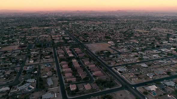 Phoenix Neighborhoods Sunset Aerial With Camelback Mountain alt