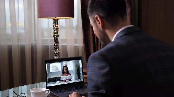 Lovely Couple Celebrating Birthday Via Video Chat alt