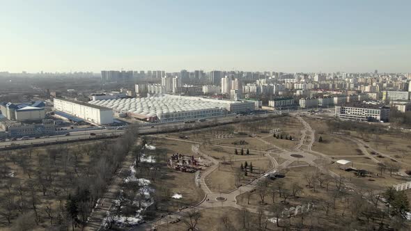Flight over the spring city park. alt