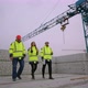 Group of Building Inspectors in Construction Site Female Architect and Male Civil Engineers - VideoHive Item for Sale