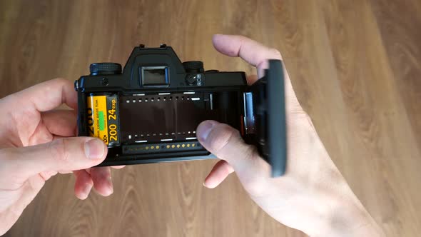 Loading Film Into SLR Film Camera alt