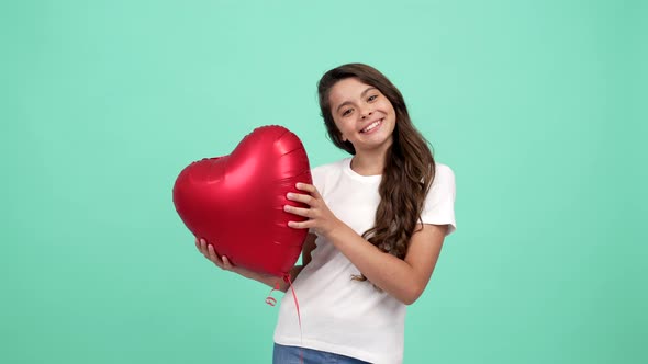 Portrait of Happy Teen Girl Let Fly Heart Party Balloon Symbol of Charity and Donation Love