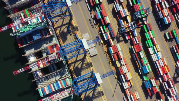 Container ship in export and import business and logistics. Shipping cargo to harbor by crane. Water alt