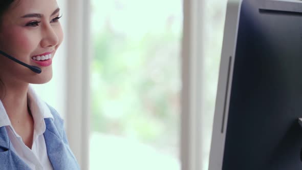 Customer Support Agent or Call Center with Headset Talking to Customer on Phone alt