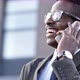 Black Businessman Talking on Phone and Smiling - VideoHive Item for Sale