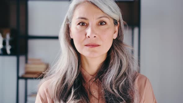 Emotional Portraits of a Paled Long Hair Asian Matured Woman alt