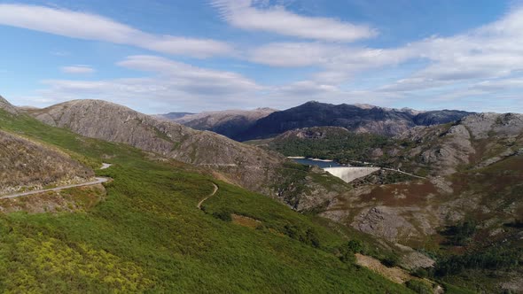 Aerial drone view of nature in Portugal. Gerês Mountains with Dam and Lake