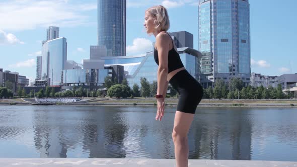 Woman working out in city