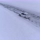 Aerial view of the rally car on a snowy road - VideoHive Item for Sale