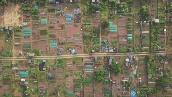 Wide Aerial footage of backyards with gardens in Exeter Devon alt