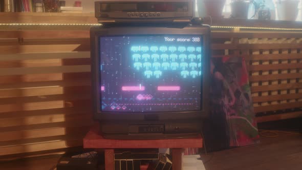 8-bit Game on TV Screen alt