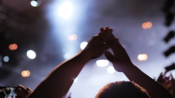Man Silhouette Partying and Clapping at Rock Concert  Close Up