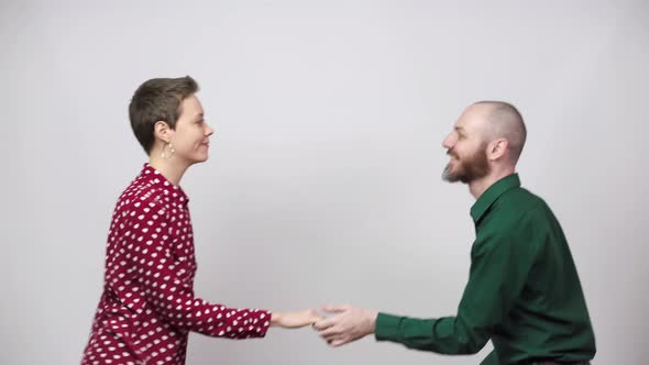 Swing dancers on white background. Man and woman are dancing.