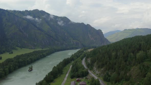 Katun river and road in mountains at during daytime