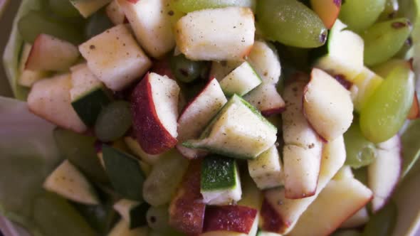 Fruits and salad in the bowl alt