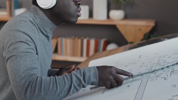 Architect in Headphones Drawing alt