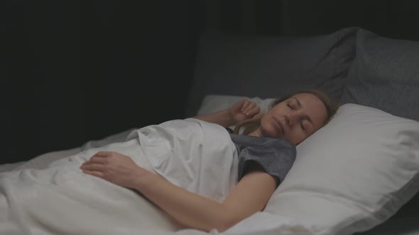 Woman Enjoying Peaceful Sleep