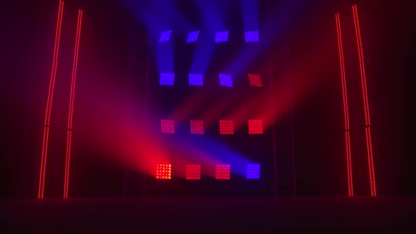The Stage of a Small Theater with Red and Blue Spotlights. Lights Are Turned on From Darkness. alt