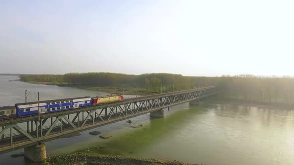 Aerial View Of Cosmesti Bridge Over Siret River Romania With Train Passing By