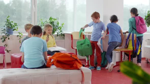 Excited Children Finishing Homework in School alt