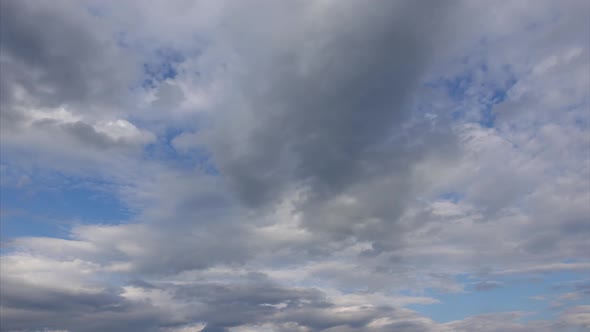 Sky with Clouds Timelapse Clouds Cover the Sun in the Blue Sky alt