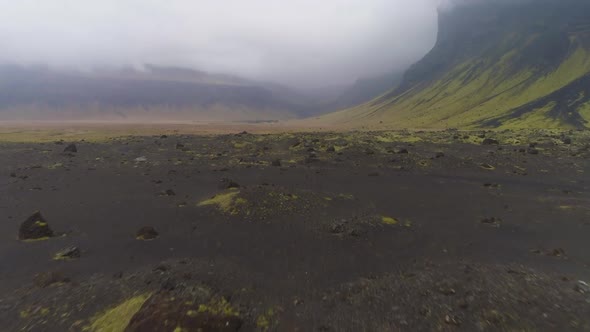 Green Mountains, Black Sand and Moss. Landscape of Iceland. Aerial View alt