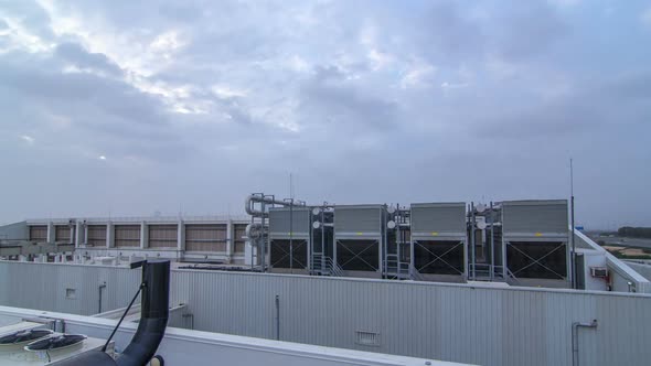 System of Industrial Central Conditioning Set on the Roof of the Building Day To Night Timelapse alt