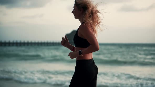 Fitness Woman Runner. Exercising Runner Cardio Jogging. Fit Athlete Jogger Workout At Sunrise. alt