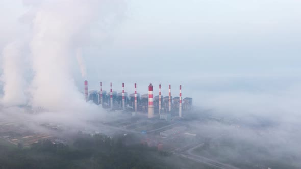 Beautiful Landscape in the morning time with fog and background Mae moh coal power plant.
